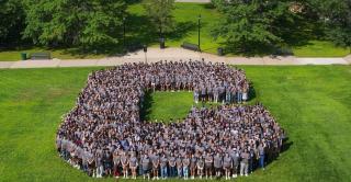 New students assemble to form a large letter “C” on Vance lawn.