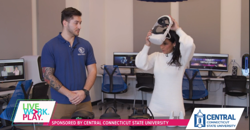 Fox Reporter Examines A VR Headset