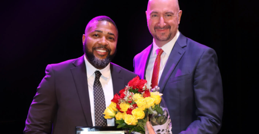 Quentin McDougald accepting teacher of the year award