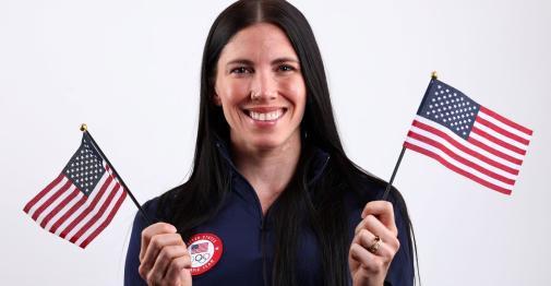 Jessica Savner waving american flags