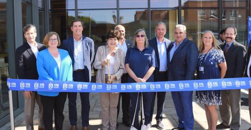 Applied Innovation Hub group photo with ribbon