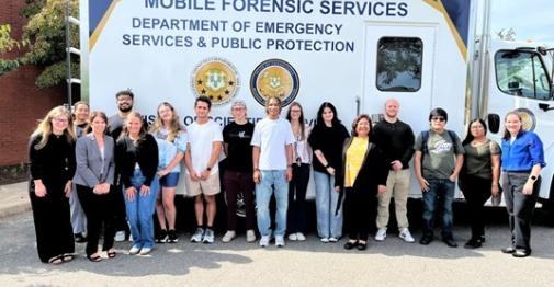 Central forensics students and faculty at the state lab