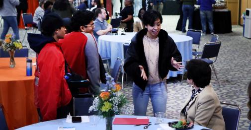 Students chat with President Toro at the annual First-Gen Celebration at Central.