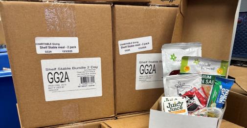 A delivery of shelf-stable meals in boxes at Maria's Place at Central