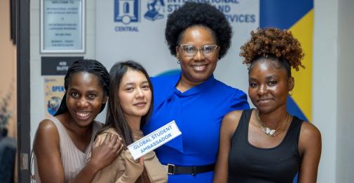 Oluwatoyin Awoderu greets some new international exchange students during an open house event on Oct. 1, 2025, at Barnard Hall. (Photo by John Henninger)