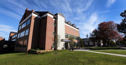 Exterior view of Barnard Hall against a blue sky