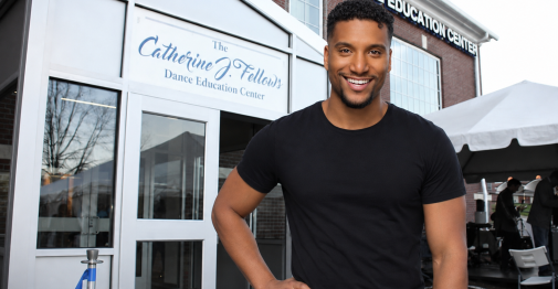 Dance Education instructor Lenard Foust in front of the Dance Education Center at Central.