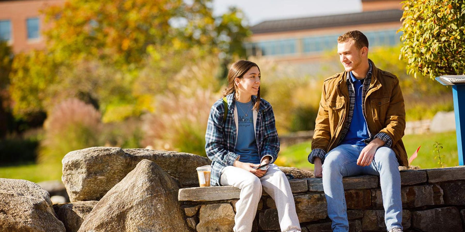 two students laughing