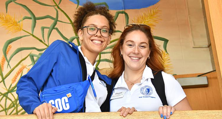 two student smiling in the student center