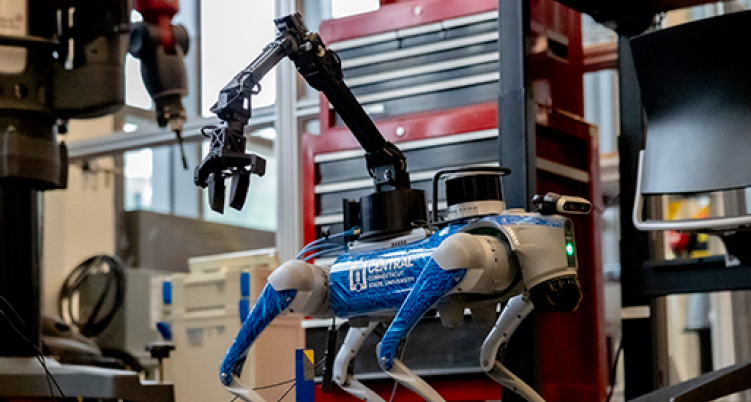 Robot dog with a claw crane and central iconography 
