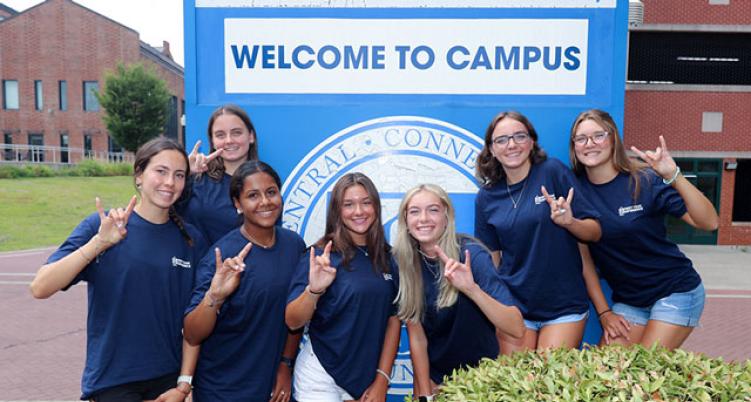 Students in front of Central sign 