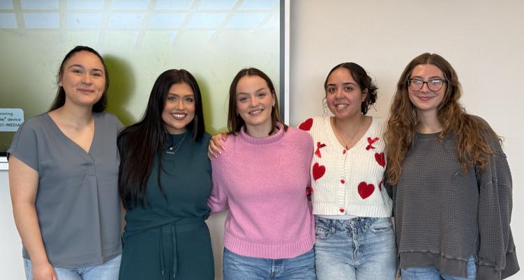 Group of people standing for photo 