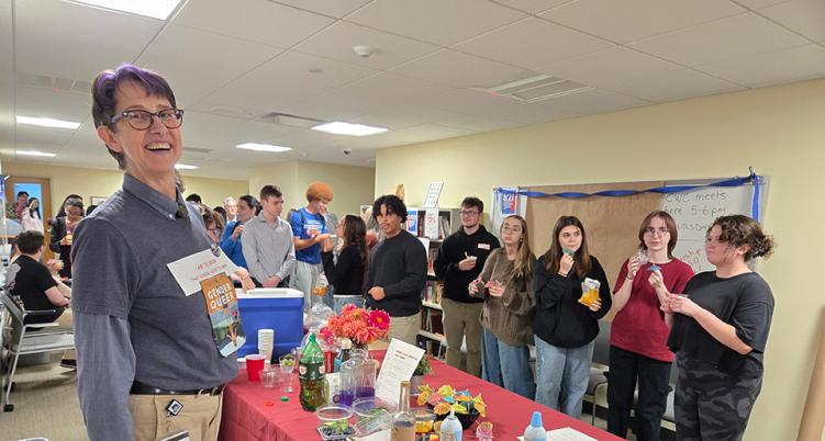 Banned Books Mocktail Party Hosted by Sigma Tau Delta and The Helix. Mocktails served by Professor Julien Strong bannedtable