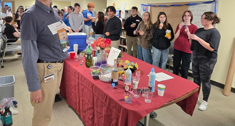 Banned Books Mocktail Party Hosted by Sigma Tau Delta and The Helix. Mocktails served by Professor Julien Strong bannedtable