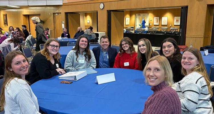 Students sitting around a table 