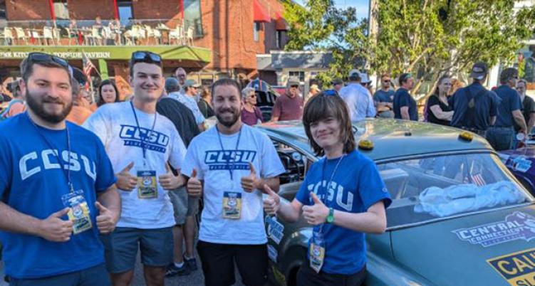 Students in front of car 