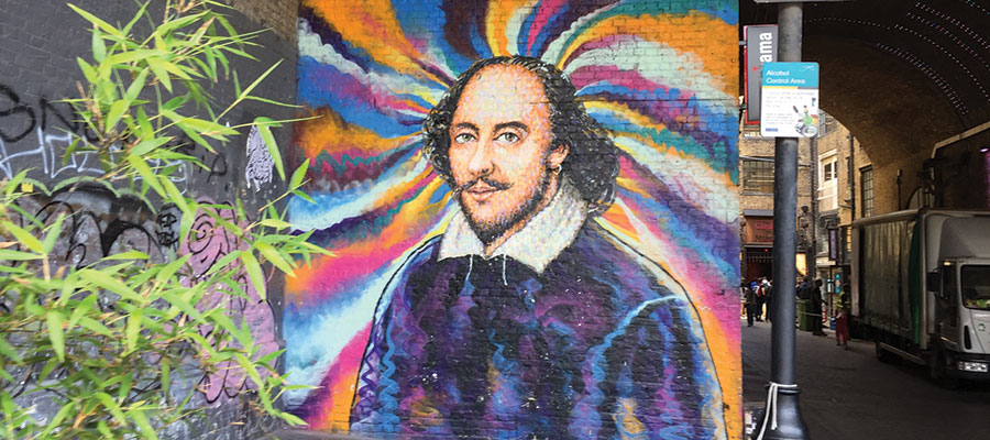 Painting of Shakespear on a brick wall